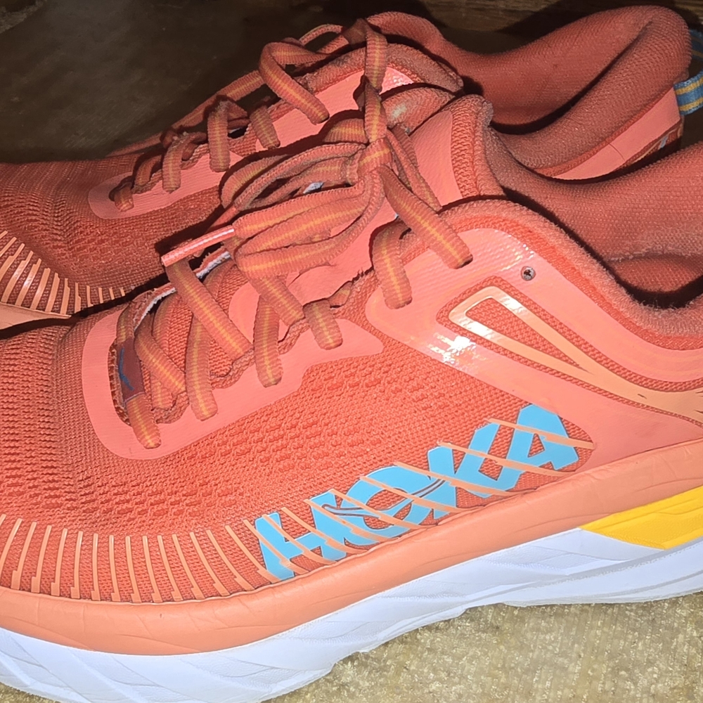 Hoka Coral Running Shoes with Blue and Yellow Highlights